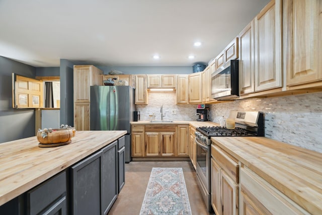 153 May St, Canaan, NH 03741 - kitchen with wooden counters, appliances with stainless steel finishes, light brown cabinetry, backsplash, and recessed lighting