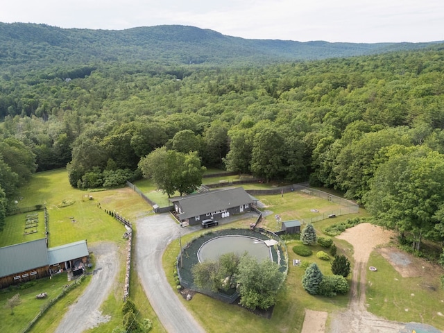 153 May St, Canaan, NH 03741 - aerial view of property's location featuring a heavily wooded area and a mountain backdrop