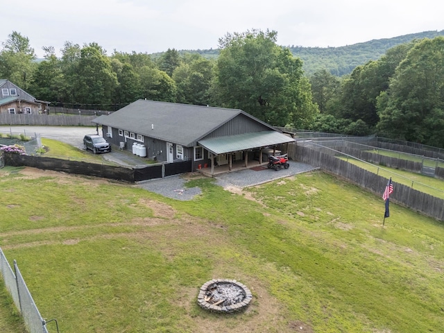 153 May St, Canaan, NH 03741 - aerial view of property and surrounding area with a heavily wooded area