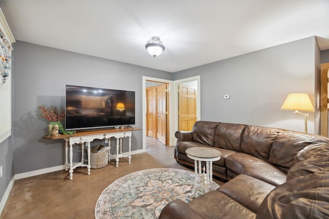 153 May St, Canaan, NH 03741 - living room featuring finished concrete floors and baseboards