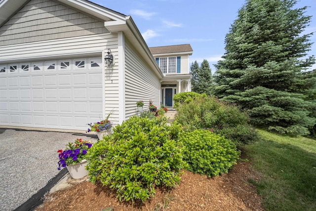 34 Mammoth Rd Unit 1, Hooksett, NH 03106 - view of side of property featuring a garage