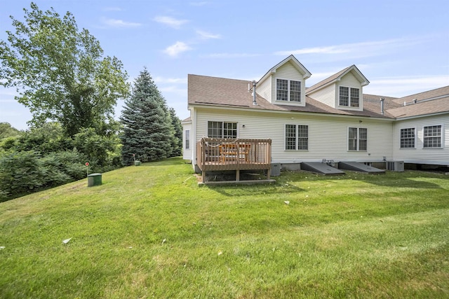 34 Mammoth Rd Unit 1, Hooksett, NH 03106 - rear view of property with a lawn, a wooden deck, and roof with shingles