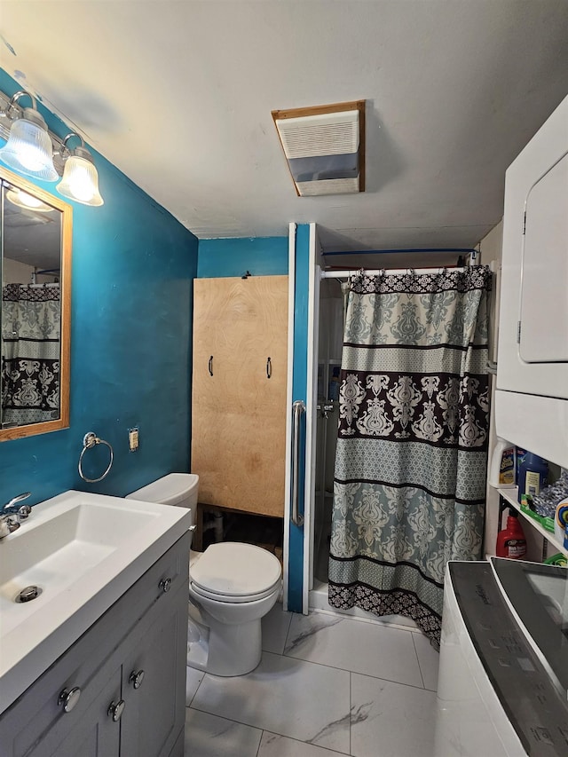 42 Upper Knight St, Keene, NH 03431 - full bathroom featuring stacked washer / dryer, vanity, a shower with curtain, and marble look tiles