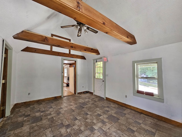 42 Upper Knight St, Keene, NH 03431 - empty room with a ceiling fan and dark stone finish floors