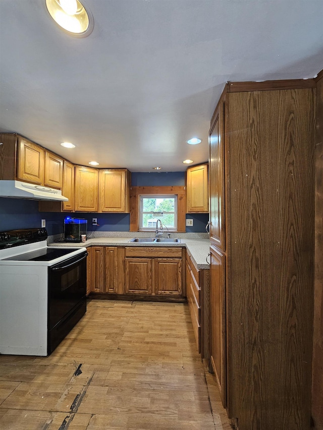 42 Upper Knight St, Keene, NH 03431 - kitchen with black electric range oven, under cabinet range hood, light wood-style floors, light countertops, and recessed lighting