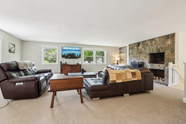 20 Meadow Ln, Atkinson, NH 03811 - living area with light colored carpet, a stone fireplace, and built in features