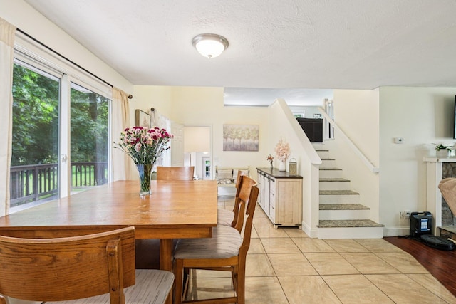 20 Meadow Ln, Atkinson, NH 03811 - dining area featuring stairway and light tile patterned floors