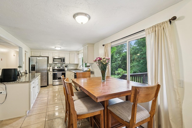 20 Meadow Ln, Atkinson, NH 03811 - dining area with light tile patterned flooring