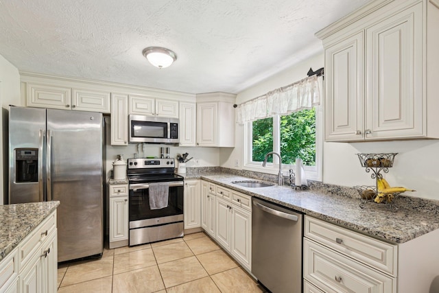 20 Meadow Ln, Atkinson, NH 03811 - kitchen with appliances with stainless steel finishes, light tile patterned flooring, and light stone countertops
