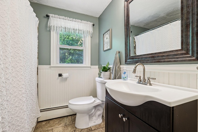 20 Meadow Ln, Atkinson, NH 03811 - bathroom with baseboard heating, a wainscoted wall, vanity, and a shower with shower curtain