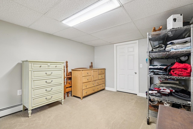 20 Meadow Ln, Atkinson, NH 03811 - spacious closet with a baseboard heating unit, a drop ceiling, and light carpet