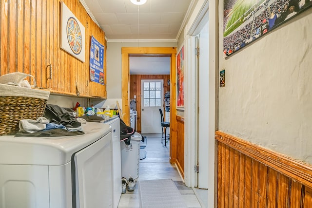 8 Myrtle St, Somersworth, NH 03878 - washroom with cabinet space, wood walls, washing machine and clothes dryer, and ornamental molding