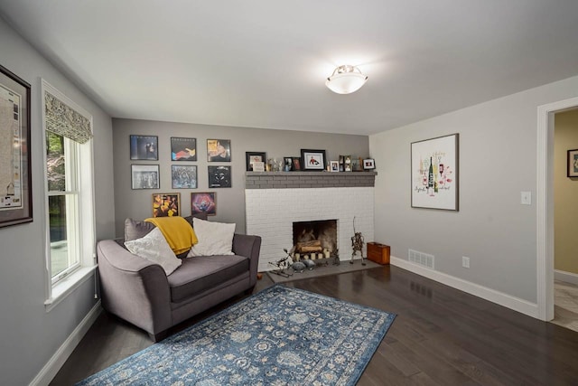 7 Dearborn Ln, Bedford, NH 03110 - living room with wood finished floors and a fireplace
