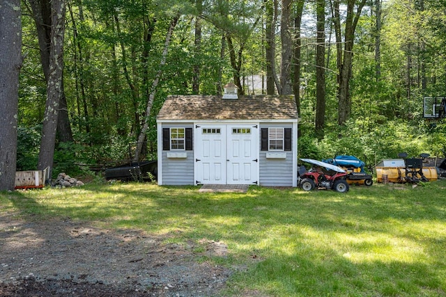 7 Dearborn Ln, Bedford, NH 03110 - view of shed featuring a view of trees