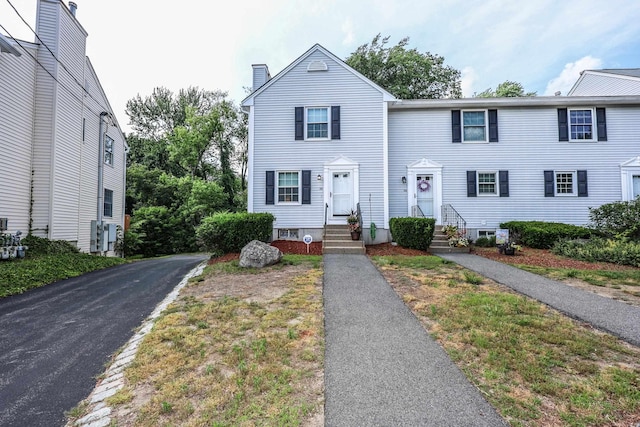 38 Brook Hollow Way, Manchester, NH 03103 - townhome / multi-family property with a chimney