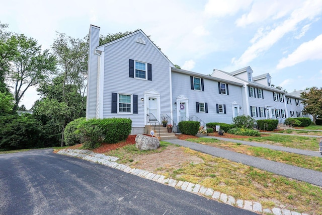 38 Brook Hollow Way, Manchester, NH 03103 - view of property with a chimney