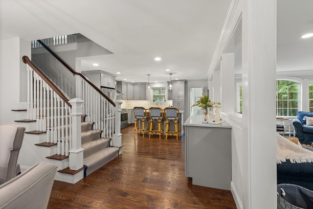 23 Rockrimmon Rd, North Hampton, NH 03862 - foyer entrance with dark wood-style flooring, stairway, recessed lighting, and ornamental molding