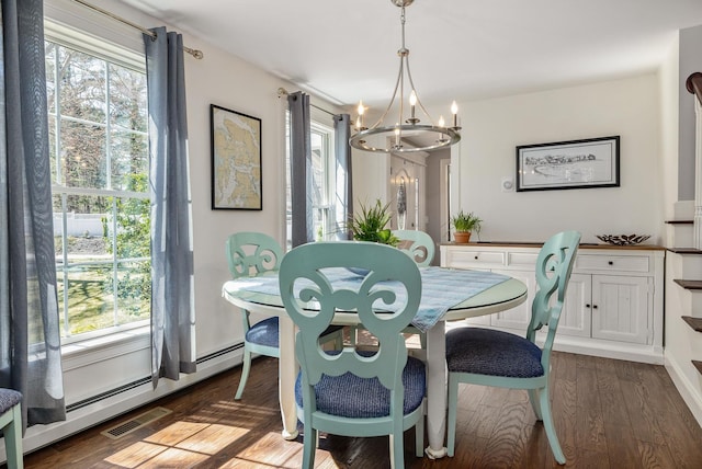 23 Rockrimmon Rd, North Hampton, NH 03862 - dining area with a chandelier, wood finished floors, and a baseboard radiator
