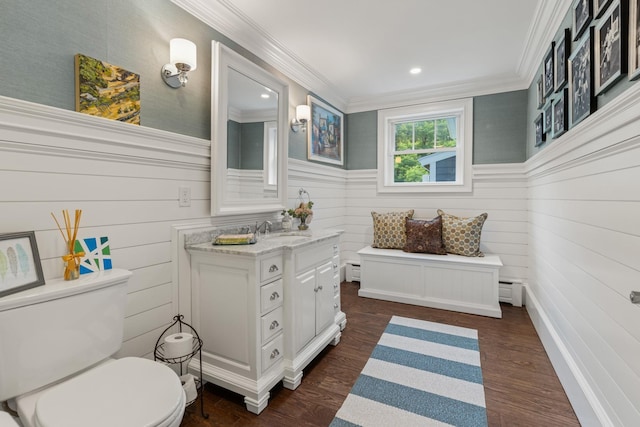23 Rockrimmon Rd, North Hampton, NH 03862 - bathroom featuring vanity, crown molding, wood finished floors, a baseboard heating unit, and wainscoting