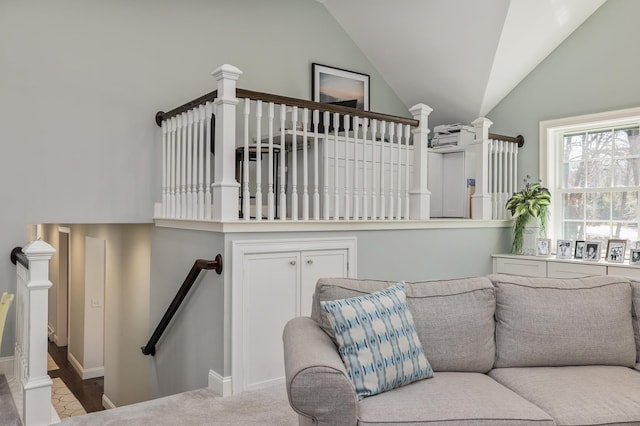 23 Rockrimmon Rd, North Hampton, NH 03862 - living room with lofted ceiling and baseboards