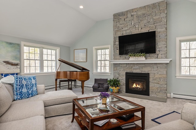 23 Rockrimmon Rd, North Hampton, NH 03862 - living area featuring baseboard heating, vaulted ceiling, plenty of natural light, and a stone fireplace