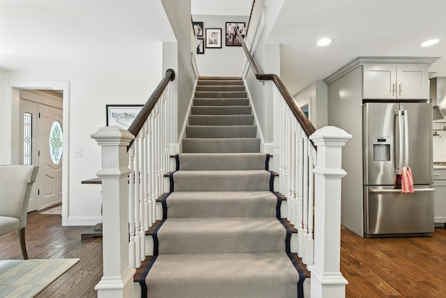 23 Rockrimmon Rd, North Hampton, NH 03862 - staircase with recessed lighting and wood finished floors