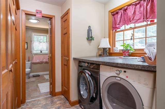 15 Baptist Hill Rd, Canterbury, NH 03224 - washroom with washing machine and dryer and stone finish floors