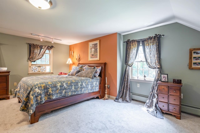 15 Baptist Hill Rd, Canterbury, NH 03224 - carpeted bedroom with a baseboard radiator, vaulted ceiling, and track lighting