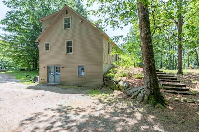 15 Baptist Hill Rd, Canterbury, NH 03224 - back of house featuring stairway