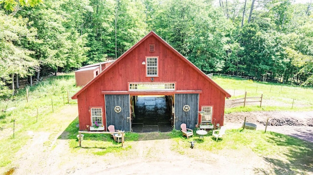 15 Baptist Hill Rd, Canterbury, NH 03224 - view of pole building featuring a forest view