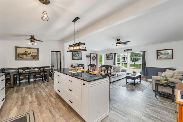 638 Benton Dr, Laconia, NH 03246 - kitchen featuring a ceiling fan, open floor plan, white cabinets, and light wood-type flooring