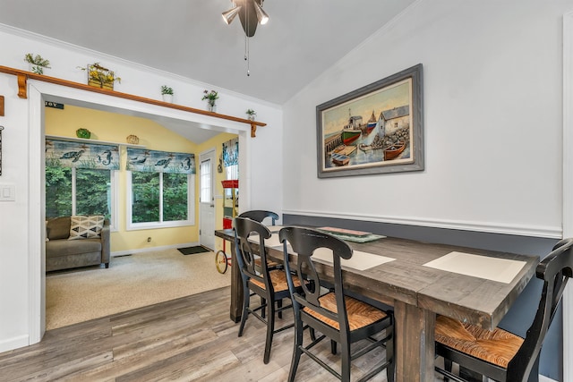 638 Benton Dr, Laconia, NH 03246 - dining area featuring lofted ceiling, ornamental molding, and wood finished floors