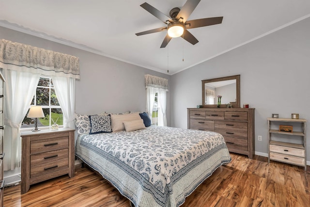 638 Benton Dr, Laconia, NH 03246 - bedroom with multiple windows, wood finished floors, lofted ceiling, crown molding, and ceiling fan