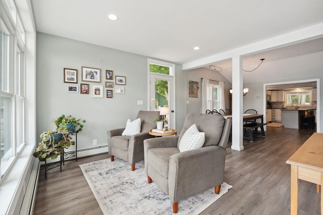 161 Micah Ter, Milton, NH 03851 - living room featuring wood finished floors, recessed lighting, baseboard heating, and a baseboard heating unit