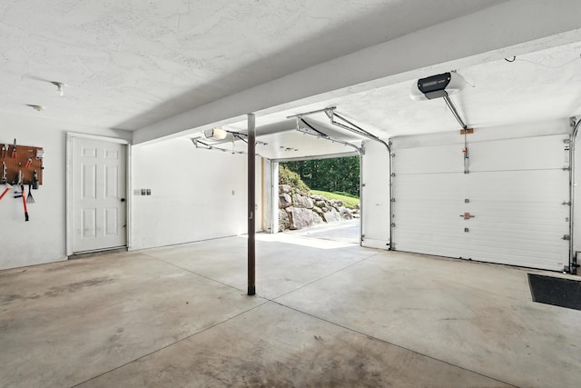 162 Drake Hill Rd, Strafford, NH 03884 - garage featuring a garage door opener