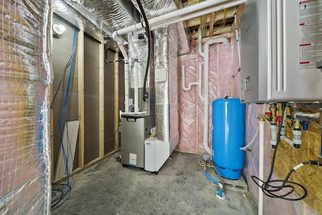 172 Tasker Hill Rd, Strafford, NH 03884 - utility room featuring tankless water heater