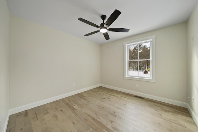 172 Tasker Hill Rd, Strafford, NH 03884 - empty room with light wood finished floors and a ceiling fan