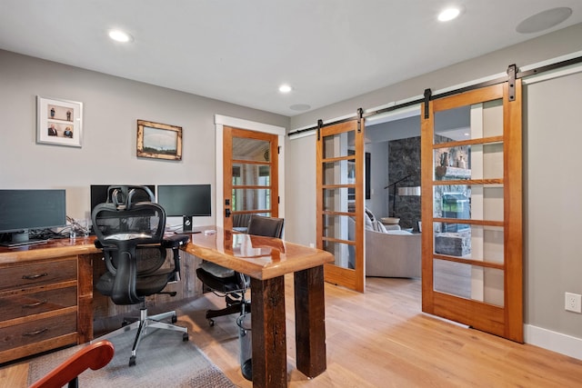 15 Glade Cir, Campton, NH 03223 - home office with a barn door, light wood-type flooring, and recessed lighting