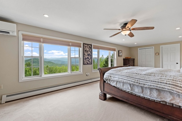 15 Glade Cir, Campton, NH 03223 - bedroom featuring a baseboard heating unit, carpet flooring, recessed lighting, ceiling fan, and a wall mounted AC