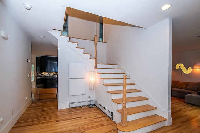 53 Lollypop Ln, Danville, NH 03819 - stairs featuring wood finished floors, recessed lighting, and a baseboard radiator