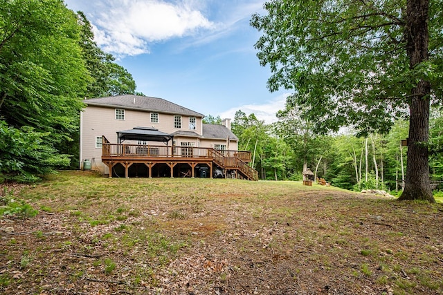 53 Lollypop Ln, Danville, NH 03819 - back of house featuring a gazebo, a chimney, a deck, and stairway
