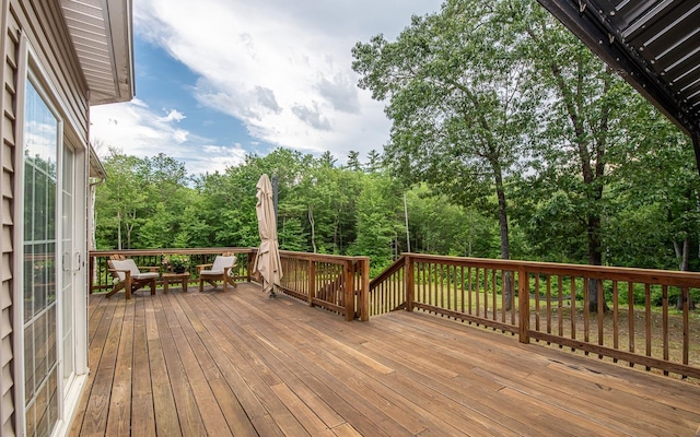53 Lollypop Ln, Danville, NH 03819 - wooden deck featuring view of wooded area