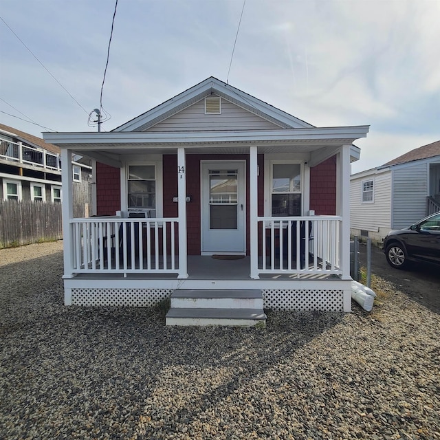 14 Johnson Ave Unit A, Hampton, NH 03842 - shotgun-style home with covered porch
