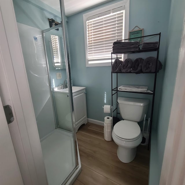 14 Johnson Ave Unit A, Hampton, NH 03842 - bathroom featuring vanity, wood finished floors, and a shower stall