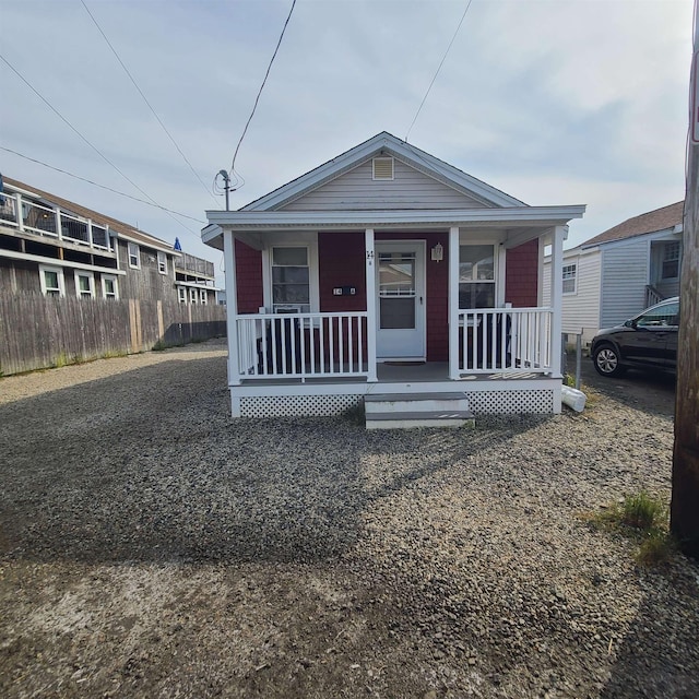 14 Johnson Ave Unit A, Hampton, NH 03842 - shotgun-style home featuring a porch