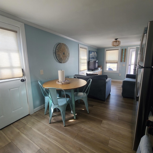 14 Johnson Ave Unit A, Hampton, NH 03842 - dining room with ornamental molding and wood finished floors