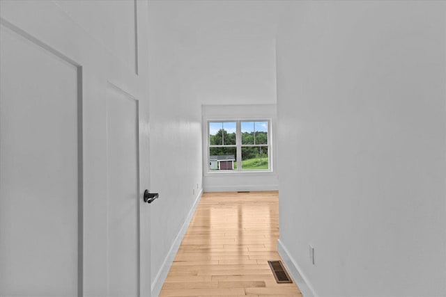 29 Taft St, Essex Junction, VT 05452 - corridor featuring light wood-type flooring and baseboards
