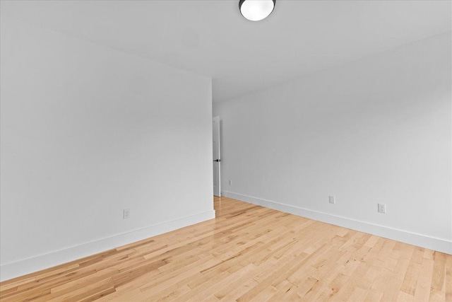 29 Taft St, Essex Junction, VT 05452 - spare room featuring wood finished floors and baseboards