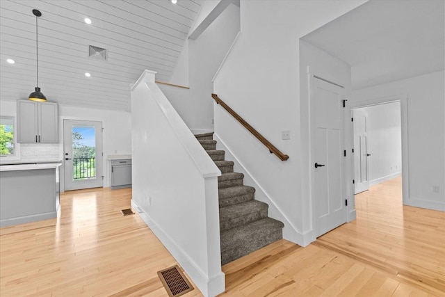 29 Taft St, Essex Junction, VT 05452 - staircase with hardwood / wood-style floors, recessed lighting, lofted ceiling, and wooden ceiling