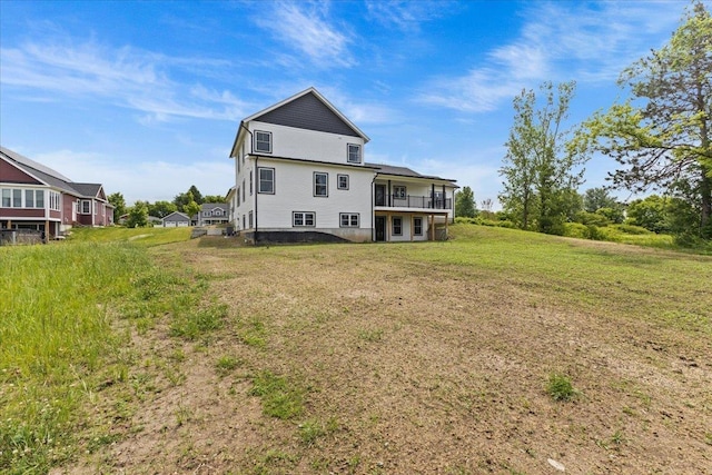 29 Taft St, Essex Junction, VT 05452 - back of property with a lawn and a balcony